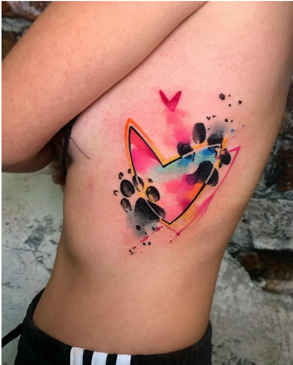colorful memorial paw print tattoo 