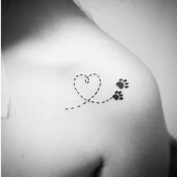 memorial paw print tattoo with a heart