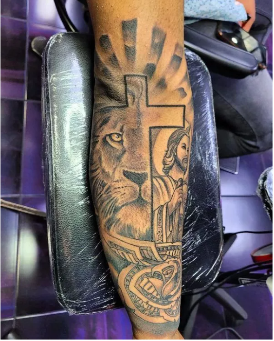  san judas tattoo  with cross and lion