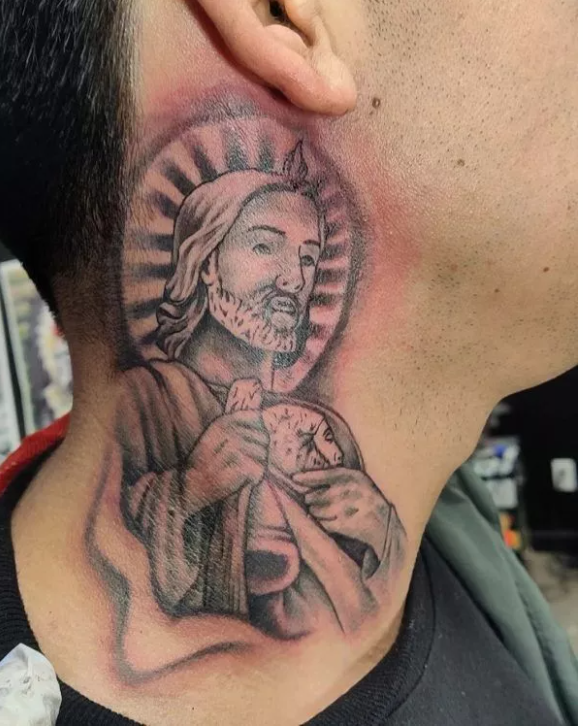  san judas tattoo  on neck